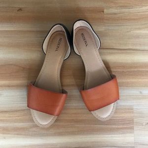 Tan and black sandals